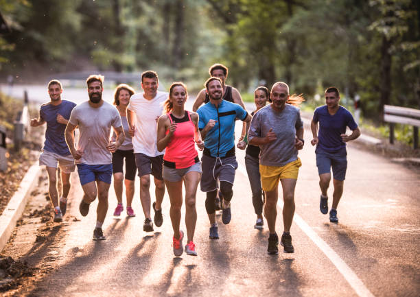 Group of people jogging together for health